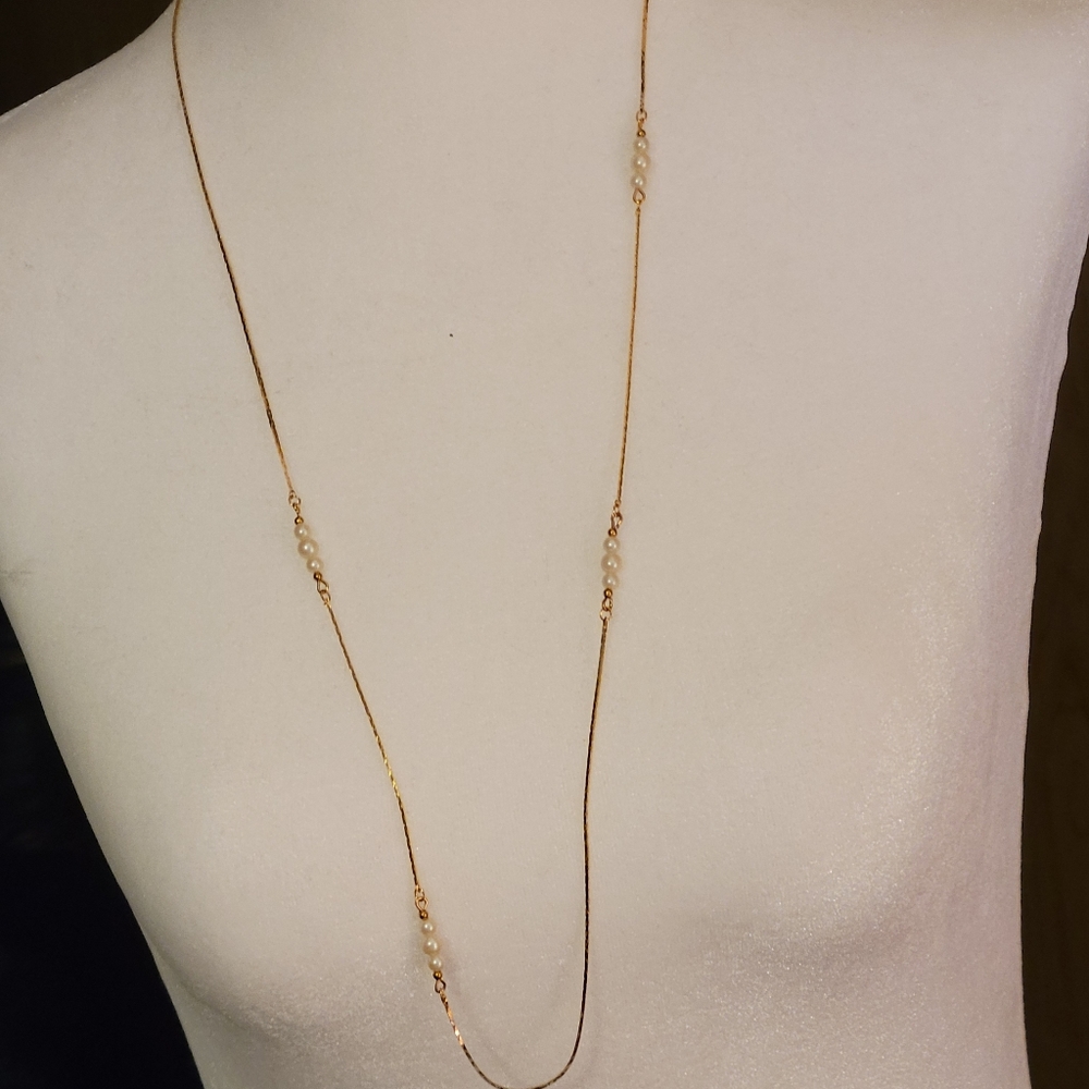 Long gold/pearl necklace